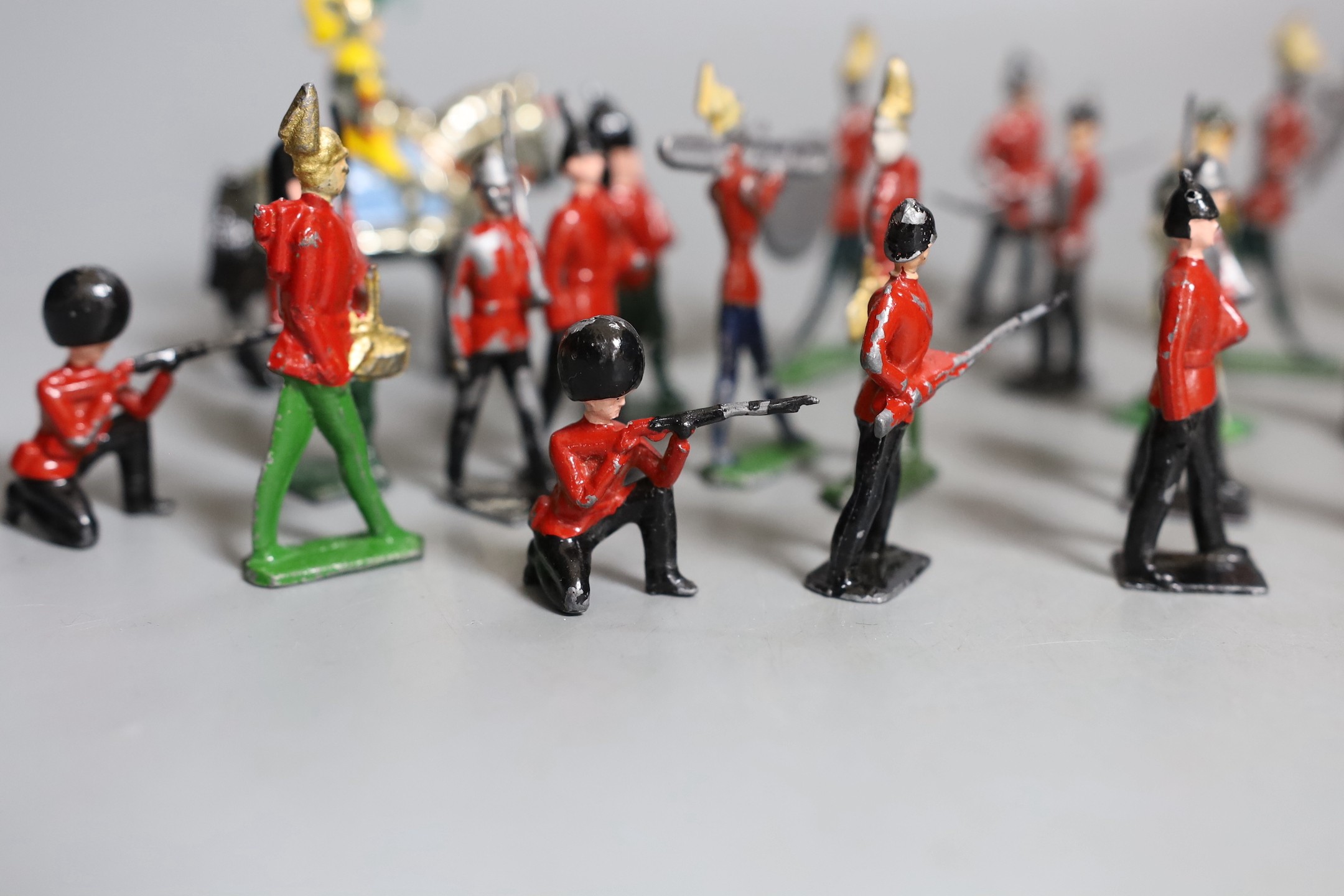 A quantity of cold painted lead soldiers and band.
